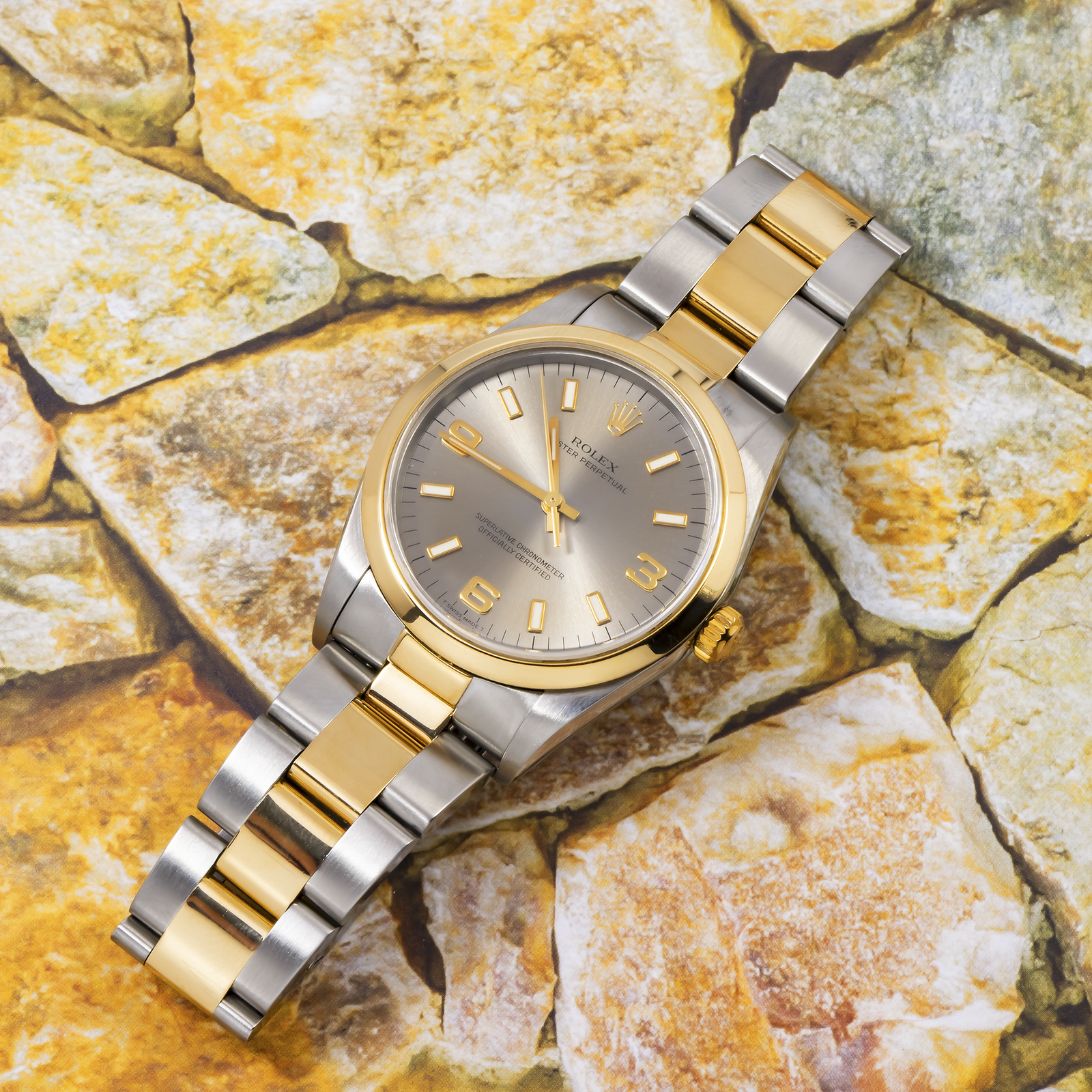rolex oyster perpetual 34mm 14203 silver arabic dial smooth bezel two tone yellow gold oyster bracelet rolex oyster perpetual 34mm 14203 silver arabic dial smooth bezel two tone yellow gold oyster bracelet